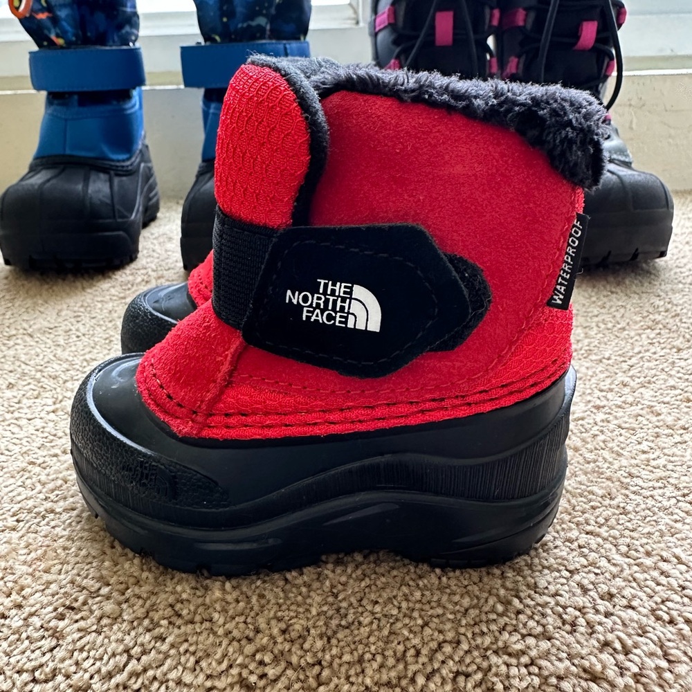 The North Face toddler size 5 Red and Black Waterproof Snow Boots